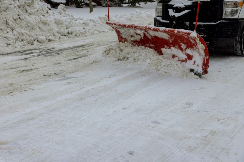 Snow Plow on Sidewalk
